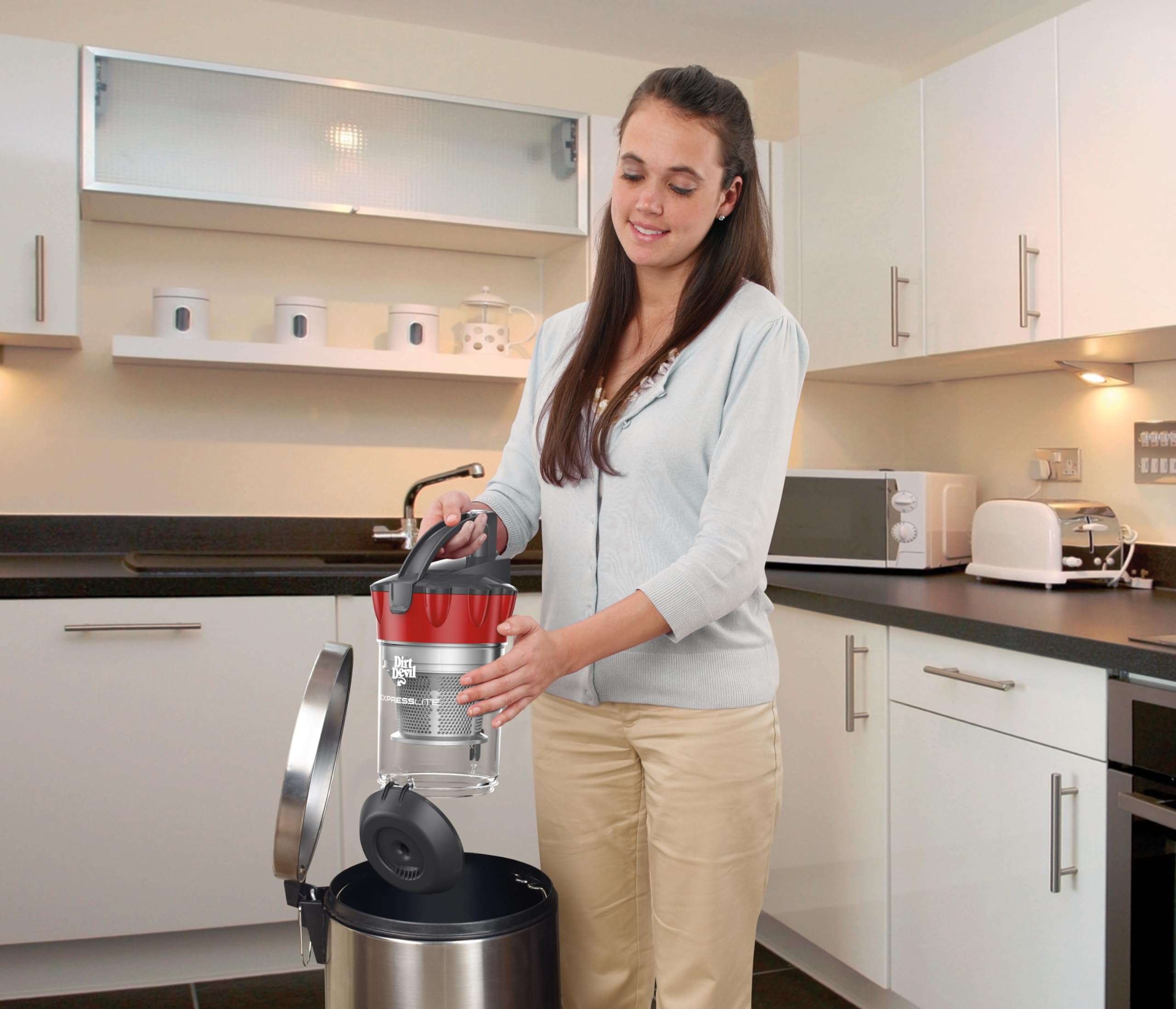 Compact cyclonic bagless canister vacuum with extended reach